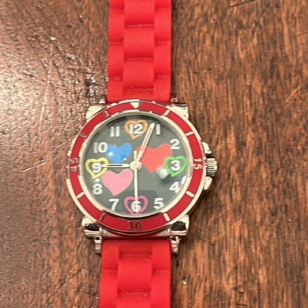 Ladies courts watch with pink silicone band